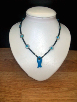 Liquidation; Poisson, turquoise et noir